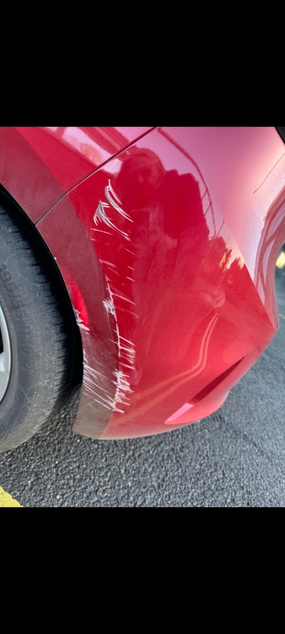 Bumper scuff and scratch repair on car